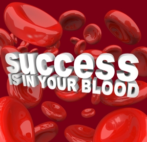 The words Success is in Your Blood surrounded by red cells